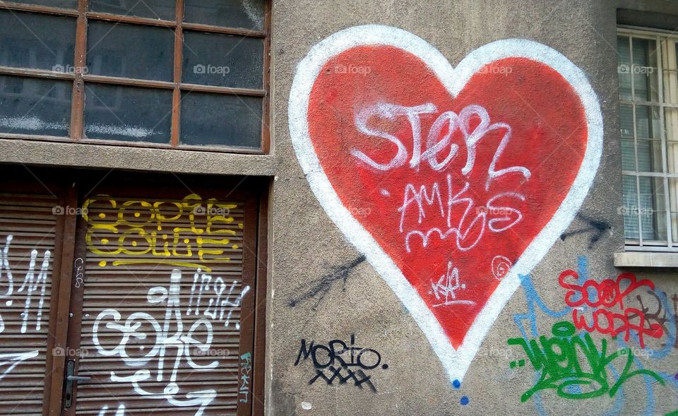 Heart on the wall, street art, graffiti art