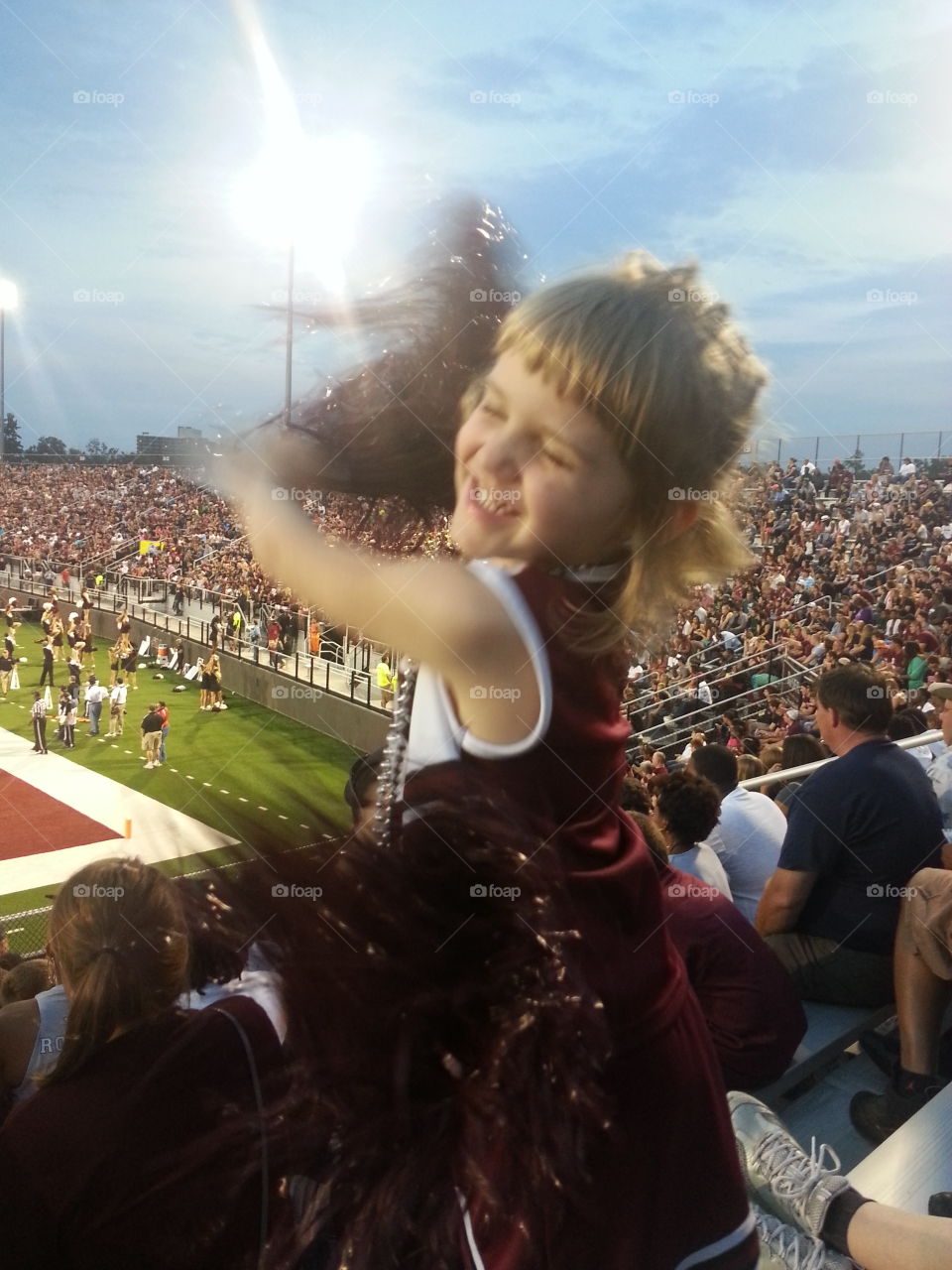 Game Time. My daughter's first college football game having a blast cheering for our team.