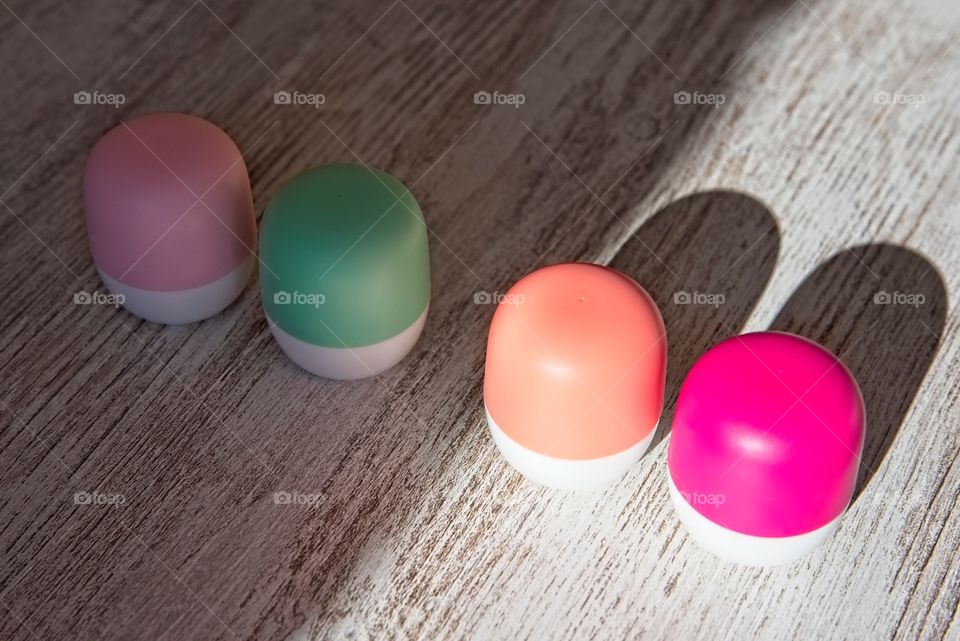 Lipsticks on a wooden table