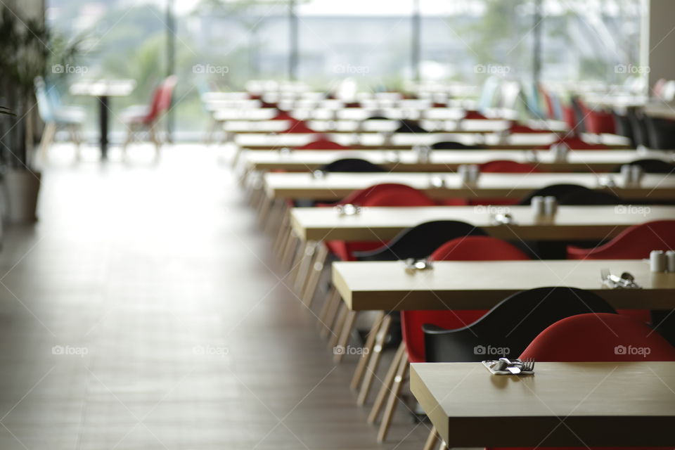 selective focus of table lined up at a restaurant