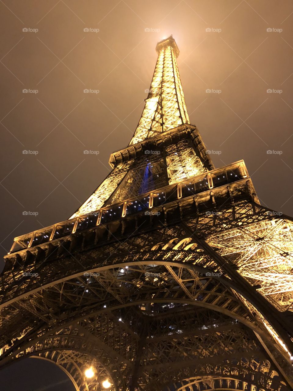 Eiffel Tower on a foggy night