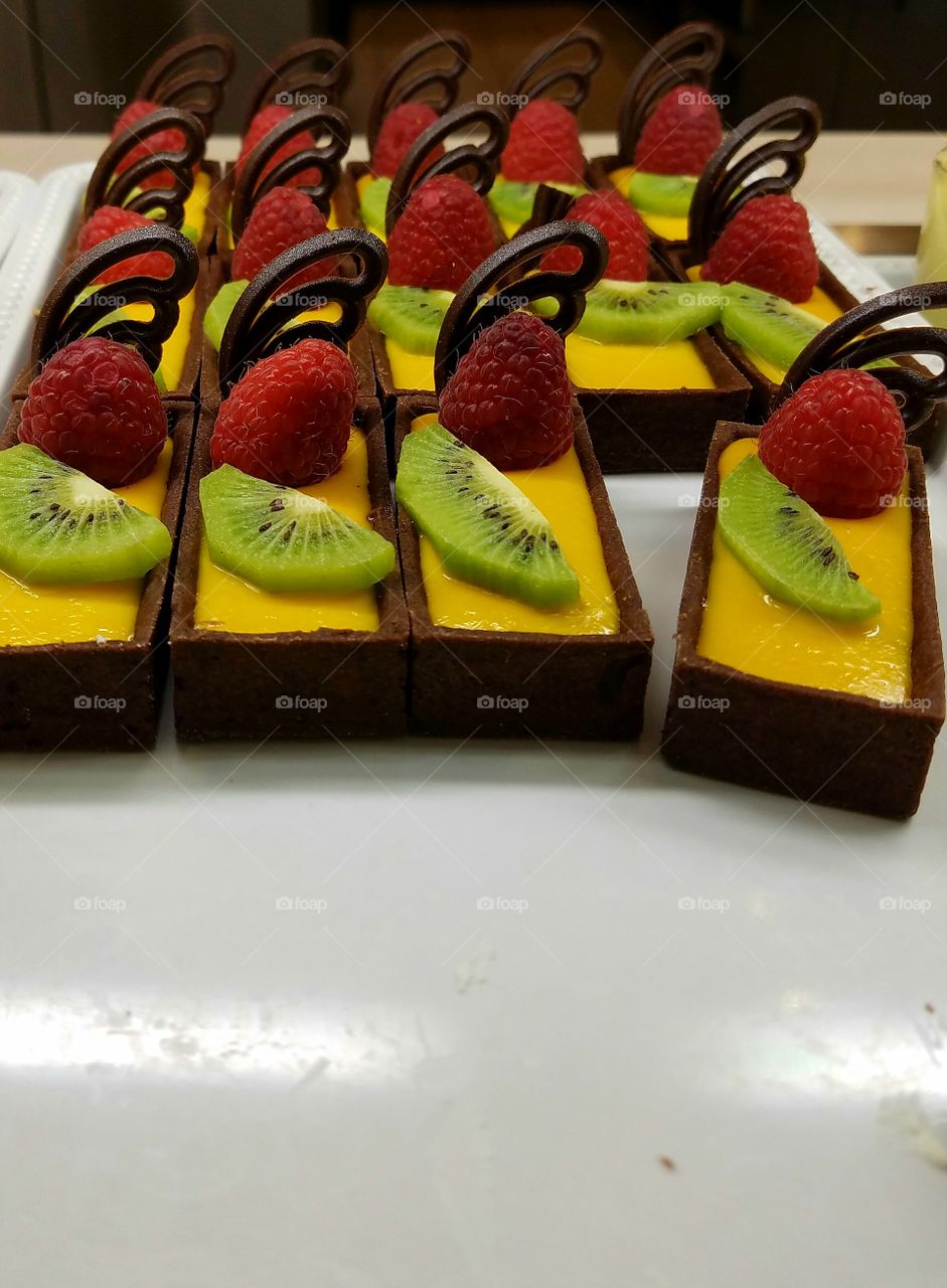 brownies with colorful fresh fruit toppings