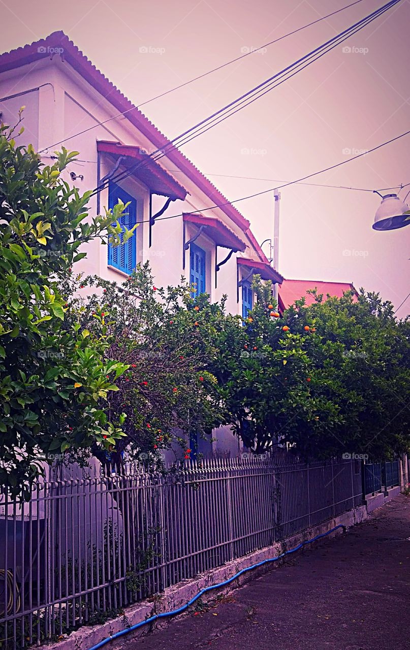 house in red atmosphere due to the south wind from macreb (north africa)