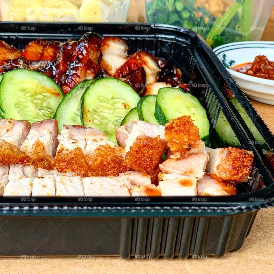 Dang gui duck, roasted pork belly, char siew, century egg dumpling and vegetables 