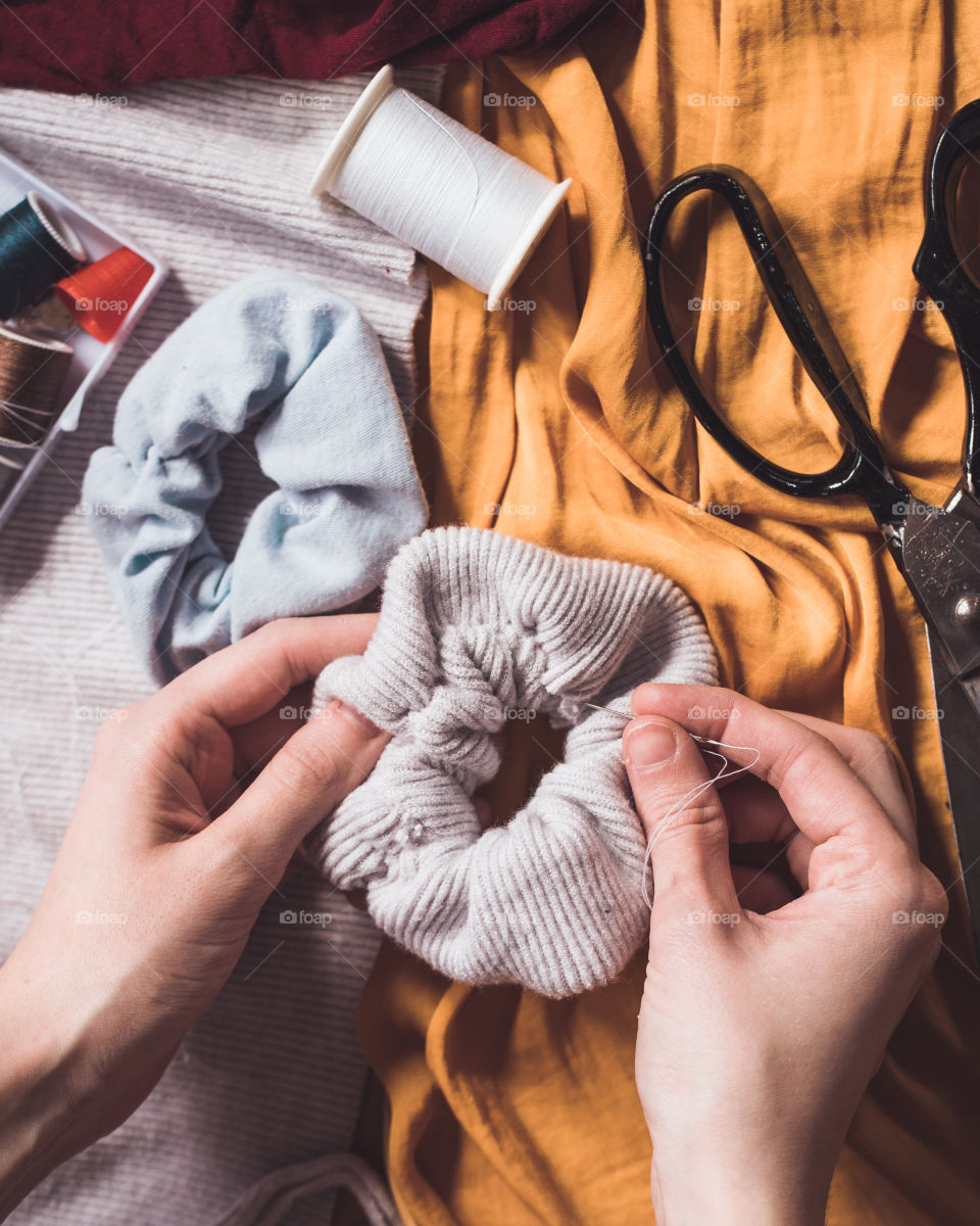 Making handmade scrunchies from old clothing 