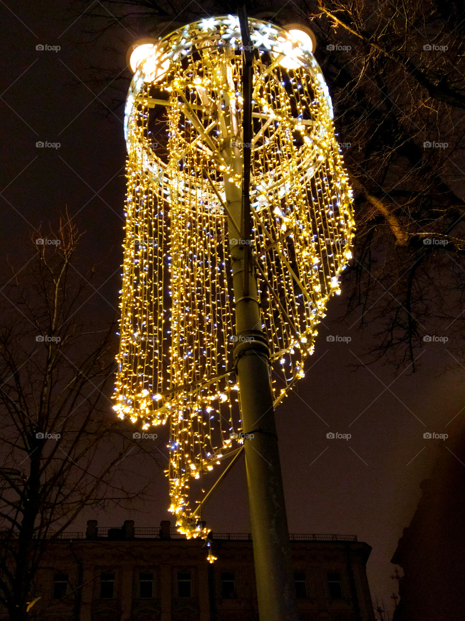 Moscow in the evening.  New Year street decorations.  One of the lights of the glowing garlands