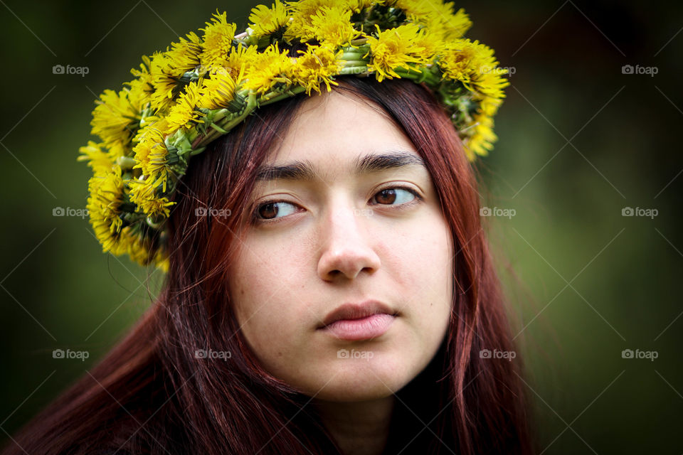 Teen girl in dandelions wreath