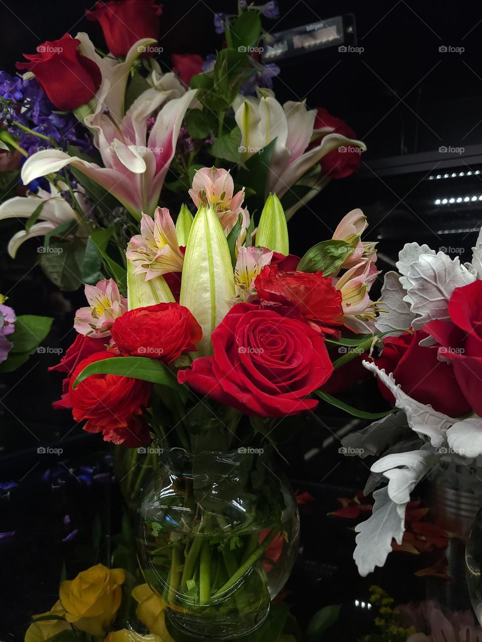 spring flowers in a glass vase, blooms honoring the end of winter