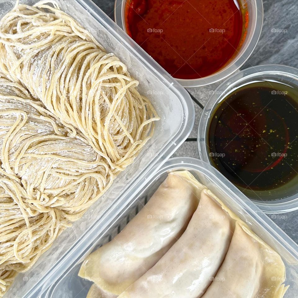 Frozen noodles and dumplings with homemade Chilli 
