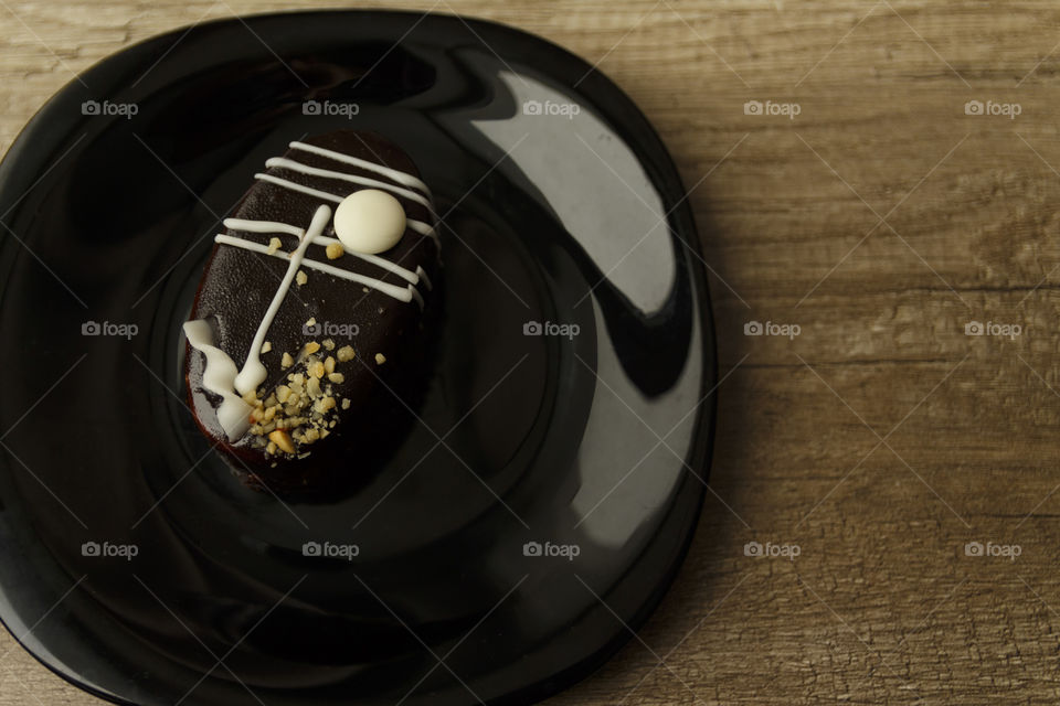 Cake in a black plate