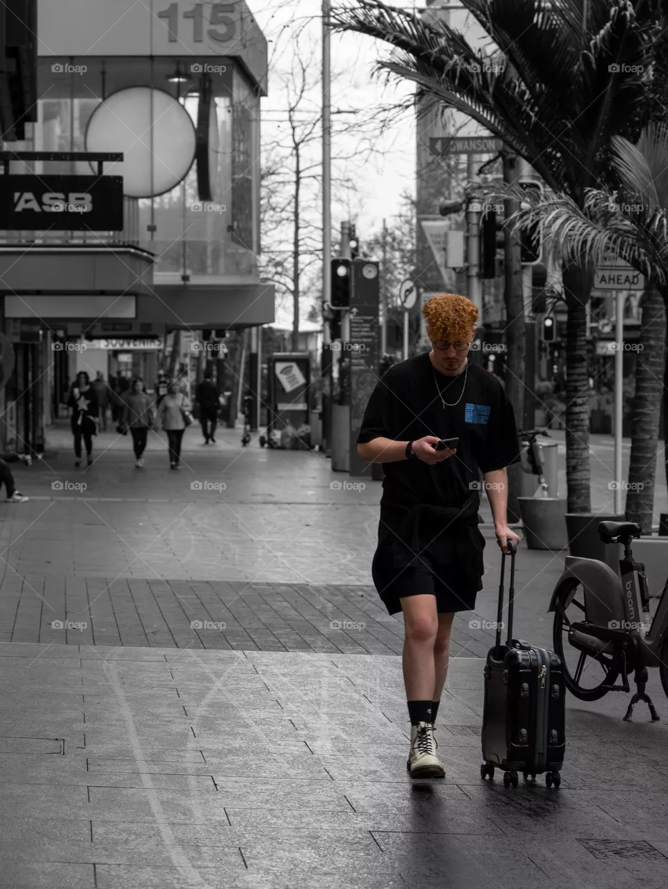 Stylish man walking on the sidewalk