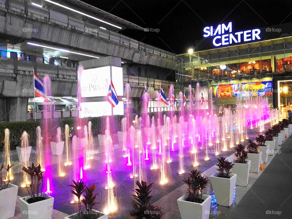 Colorful fountain. Smooth colorful fountain at Siam Center Mall Fi
eld's.