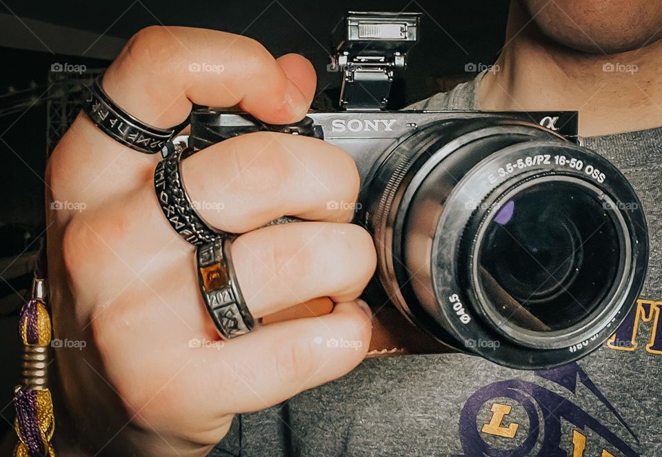Highschool ring and black matching rings.