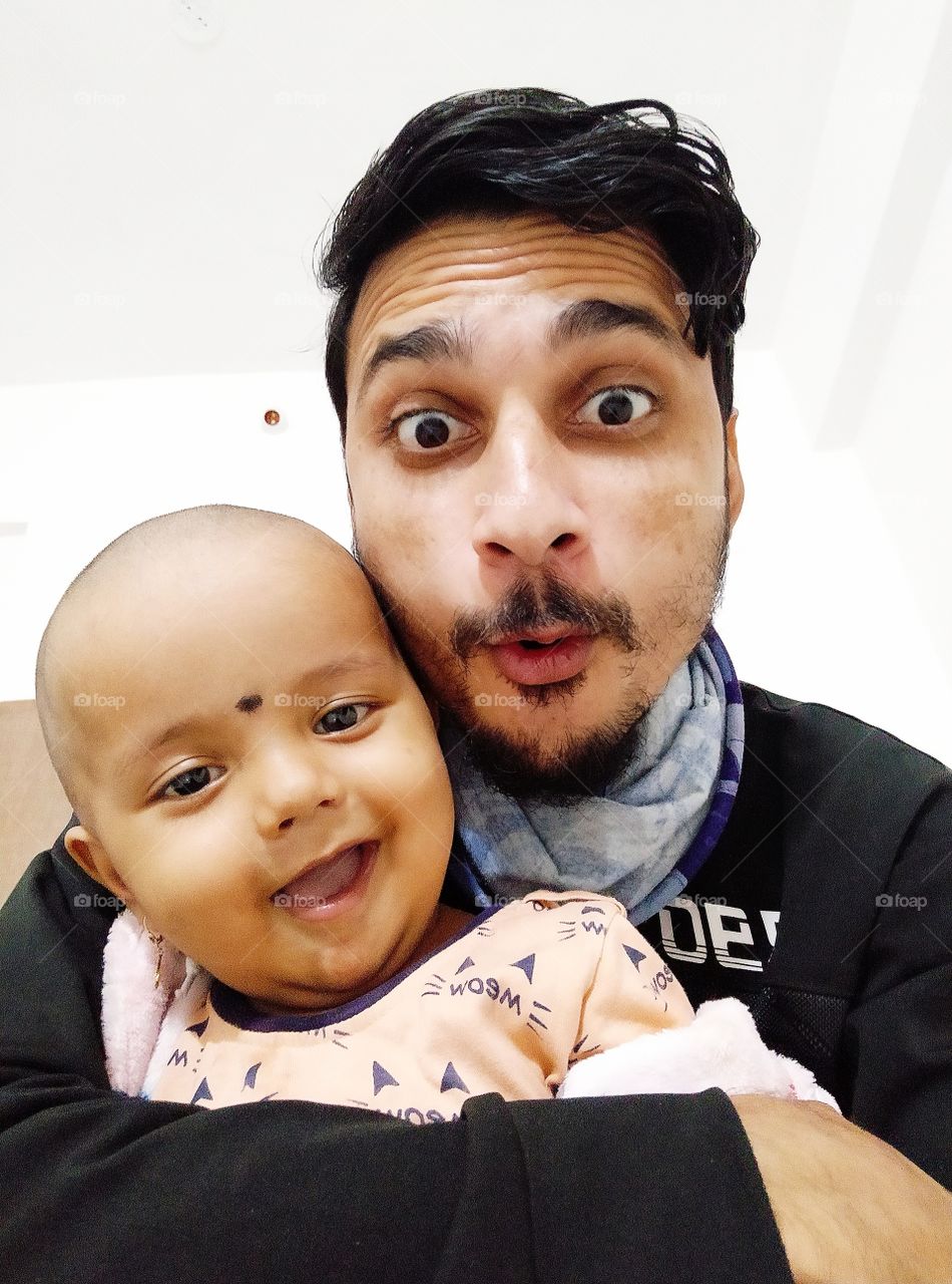 Enjoying Selfie with Little Brother in Free time