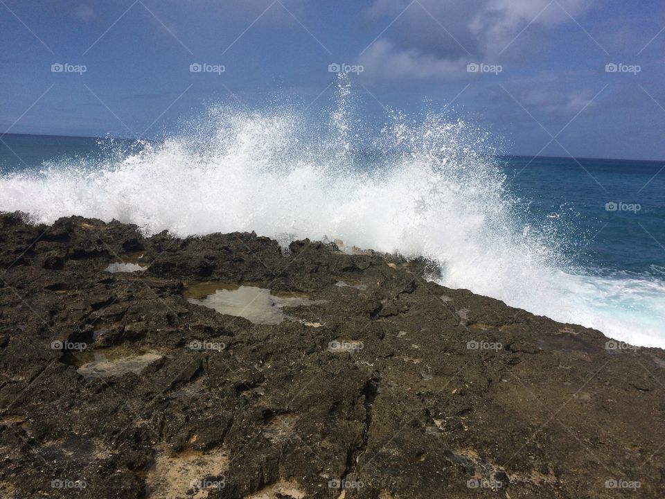 Waves on lava rock; Hawaii