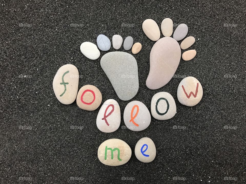 Follow me, stone feet conceptual stones art 