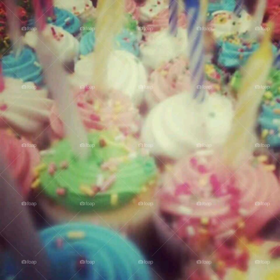 Sweet tooth. colorful cupcakes