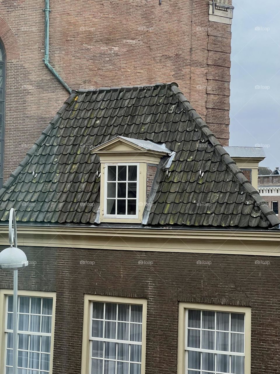 Old tiled roof of a house in the Netherlands