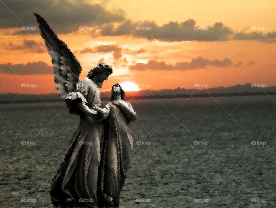 Digitally mixed photos of Angel and sunset