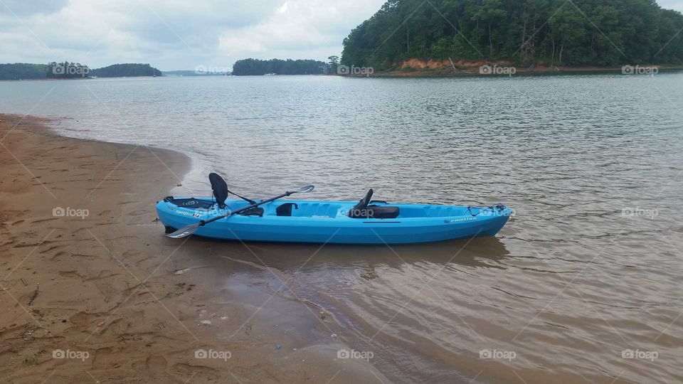 kayak on lake shoreline