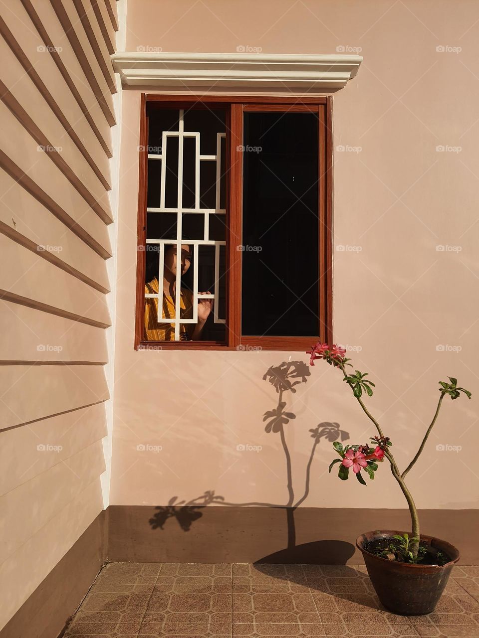 waiting for someone at the window