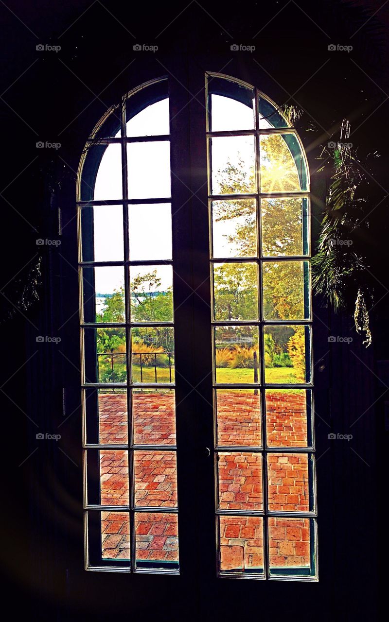 View from a beautiful arched window overlooking the courtyard.