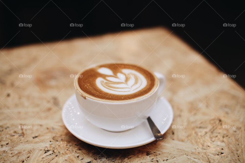 Fresh coffee in cup and saucer