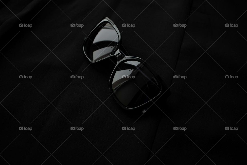 Stylish glasses on a table covered with black fabrics. Are they special enough to be noticed? 
