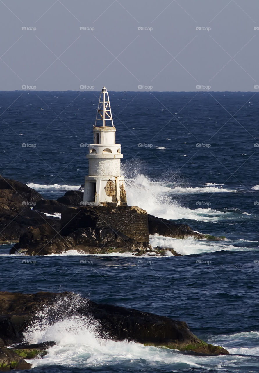 old lighthouse on rocks
