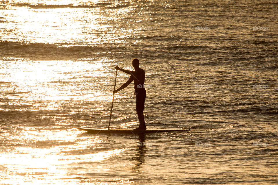 Sunrise paddle boarding