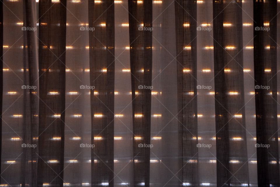 curtain and blinds in the sunset