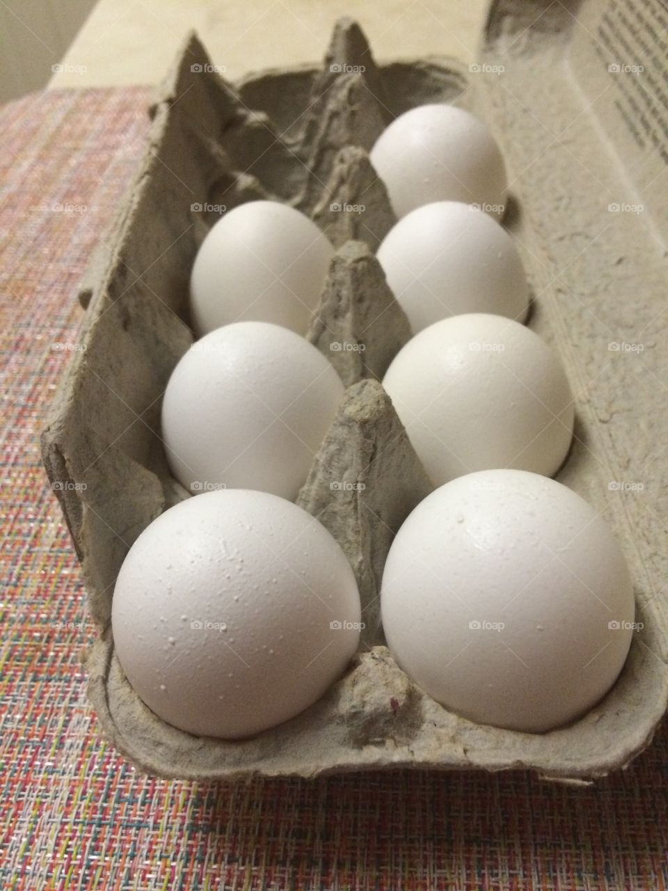 Egg carton. White eggs for baking 