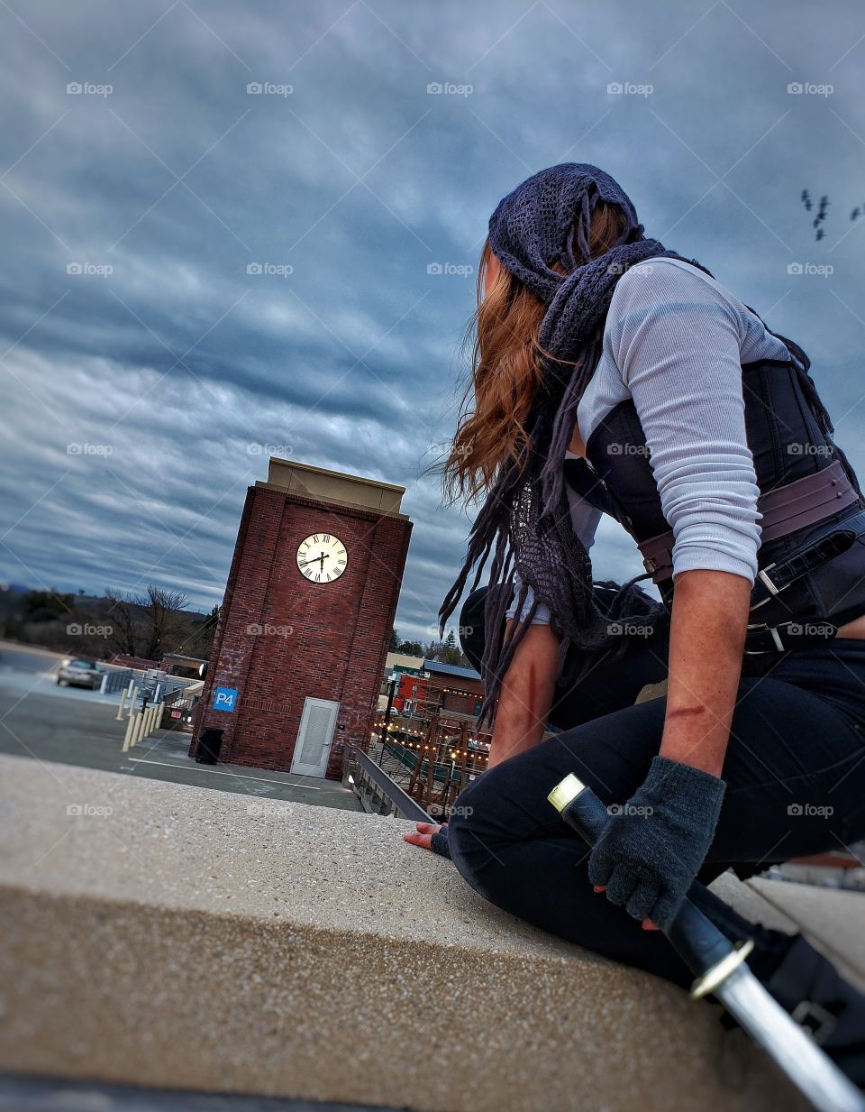 Girl on the rooftops of a clocktower