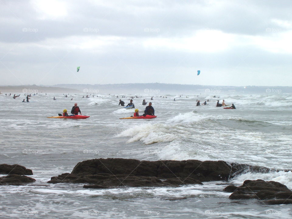 Canoeist and surfer paradise