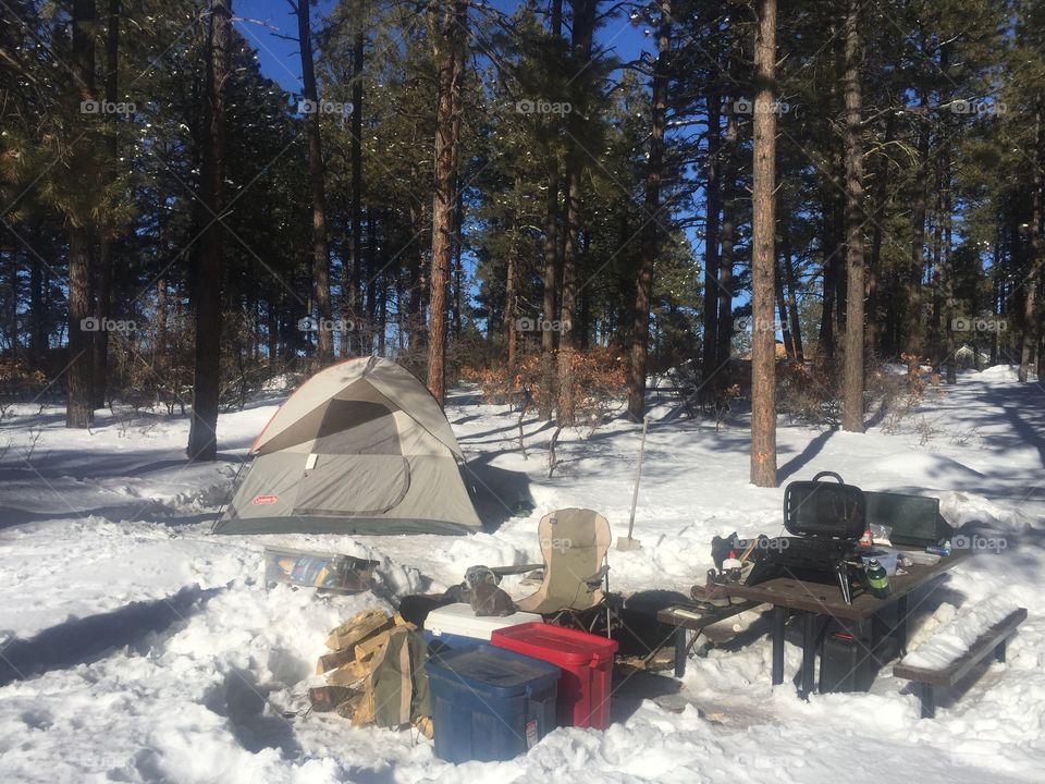 Tent camping in the wintertime snow. 