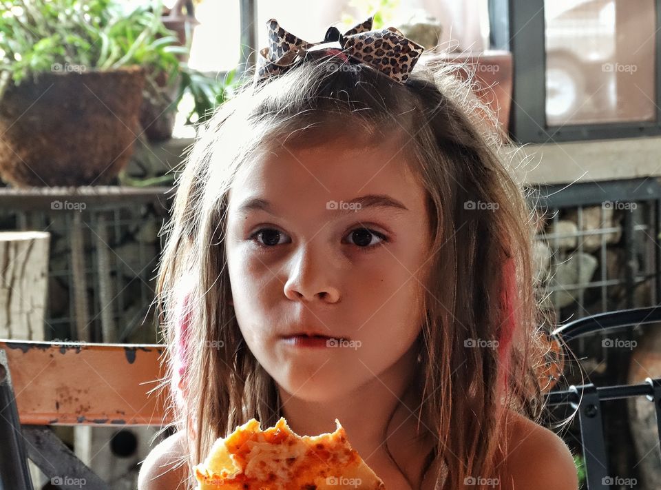 Girl Eating Pizza. Girl With Big Hair Eating Pizza
