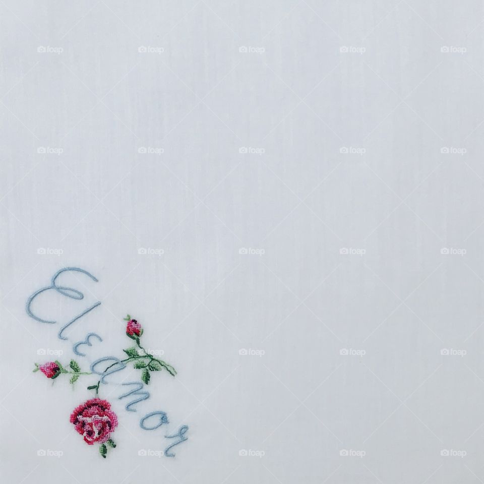 Eleanor embroidered in corner with empty white background space for inserting photos text or stationery