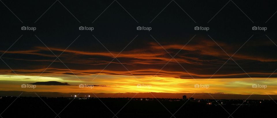 Silhouette of city at dusk