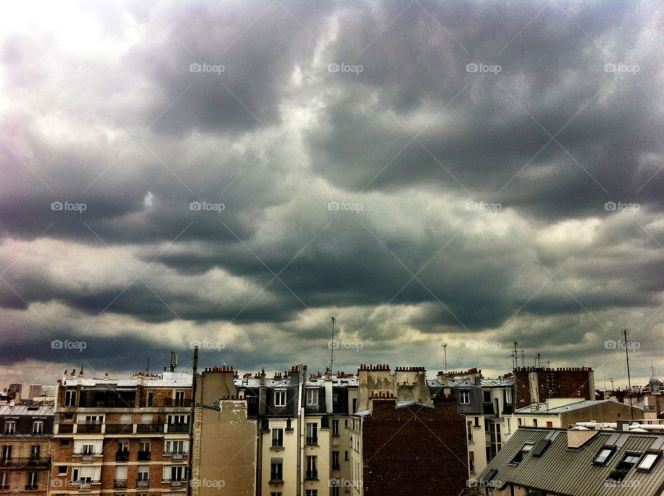 city clouds rooftops paris by pixelakias