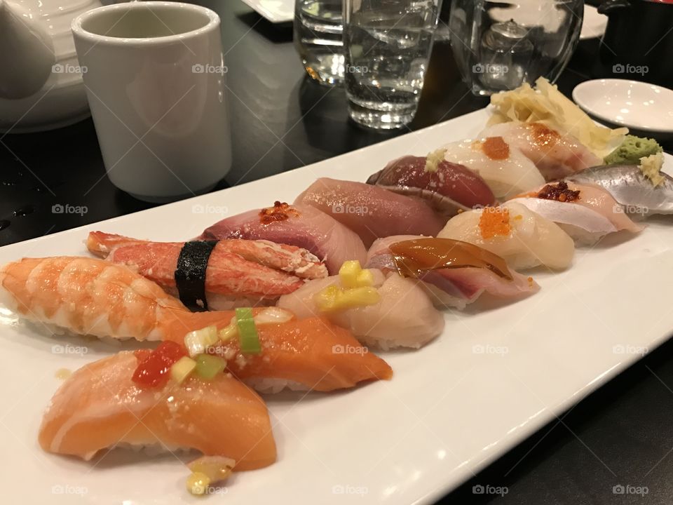 Sushi, fish, shrimps, crab, raw fish, Japanese restaurant, salmon, tuna, yellow tail,  scallop, rice,  wasabi, ginger albacore, omakase, chef choice, tea, water 