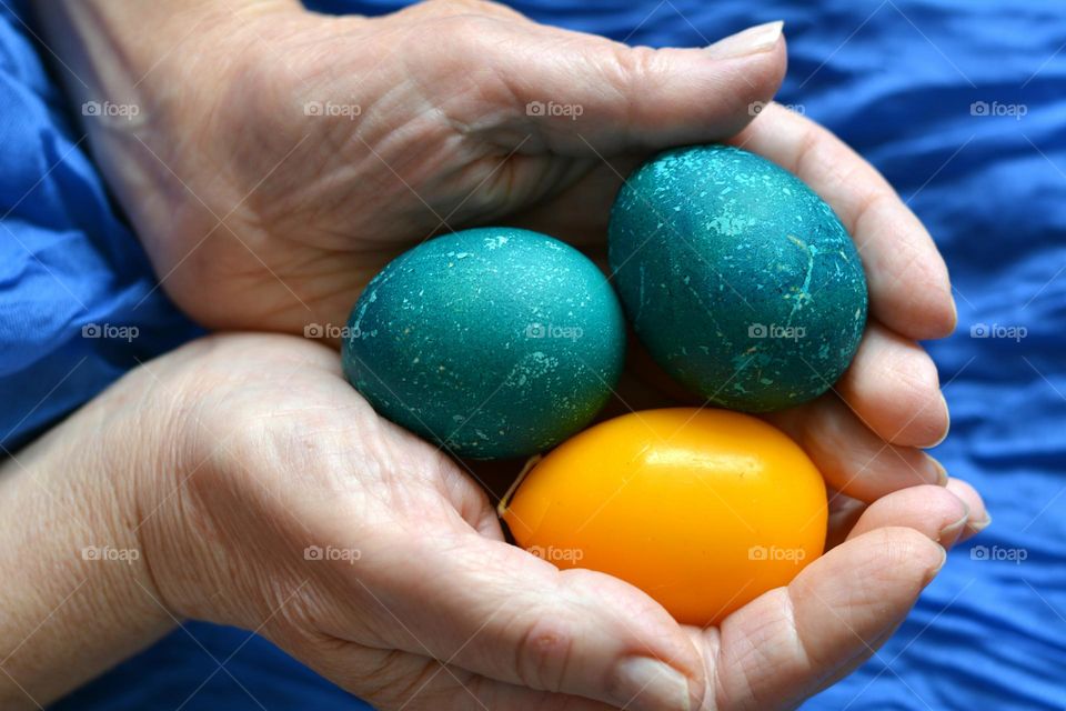 love spring time, Easter eggs in the hand, lifestyle, blue and yellow