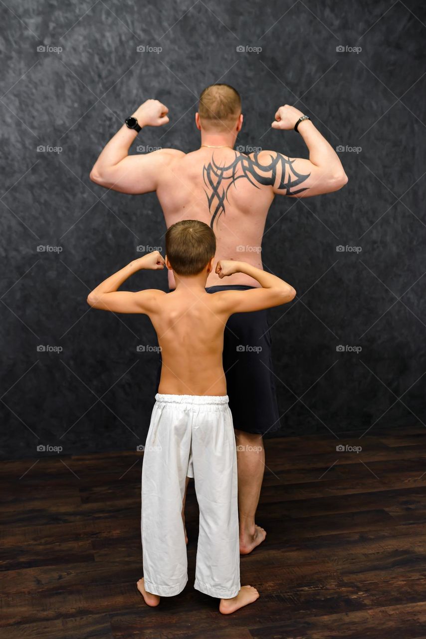 dad and son sports family, karate and boxing