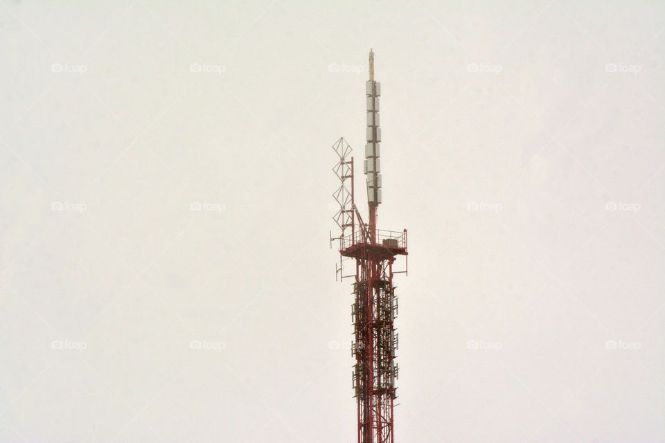 It is radio tower in my town. I shot it during evening. I wanted to show the height of the tower and its power to stay still for so long make me keep doing what i want.