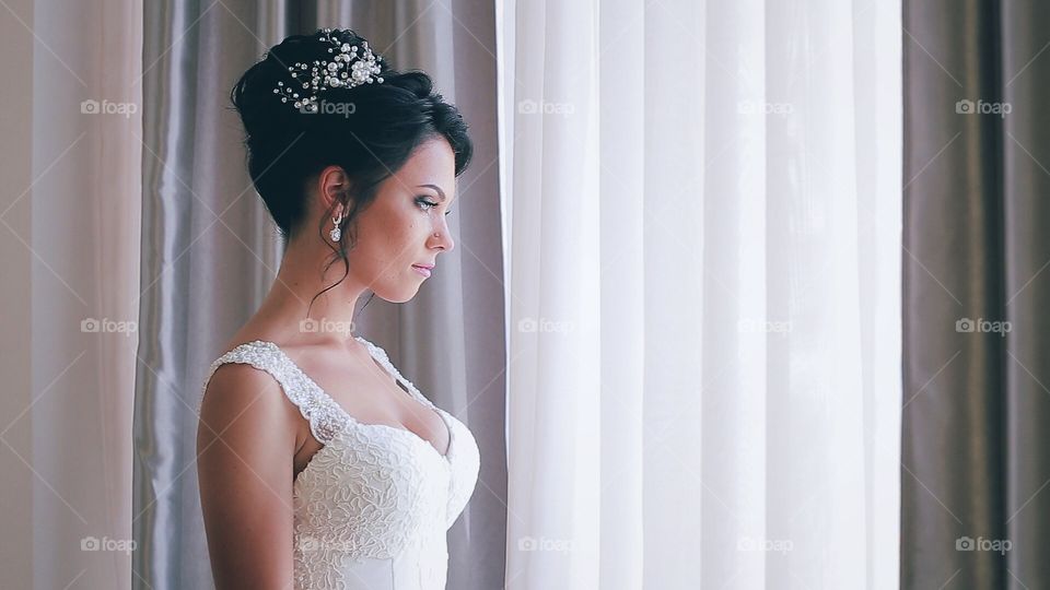 Bride near window 