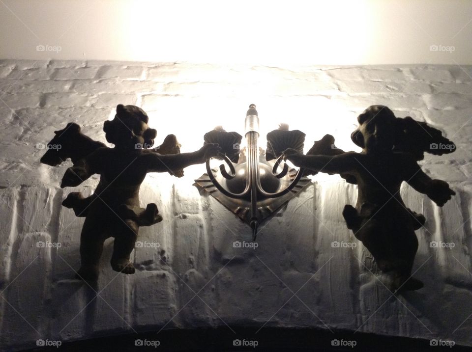 A lamp in the form of two angels