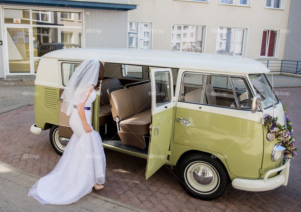 Wedding moment with vintage bus