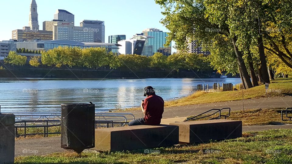 Listening to Beats by the river