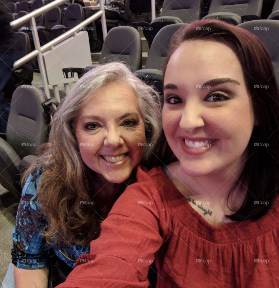 Mother and daughter at a concert 