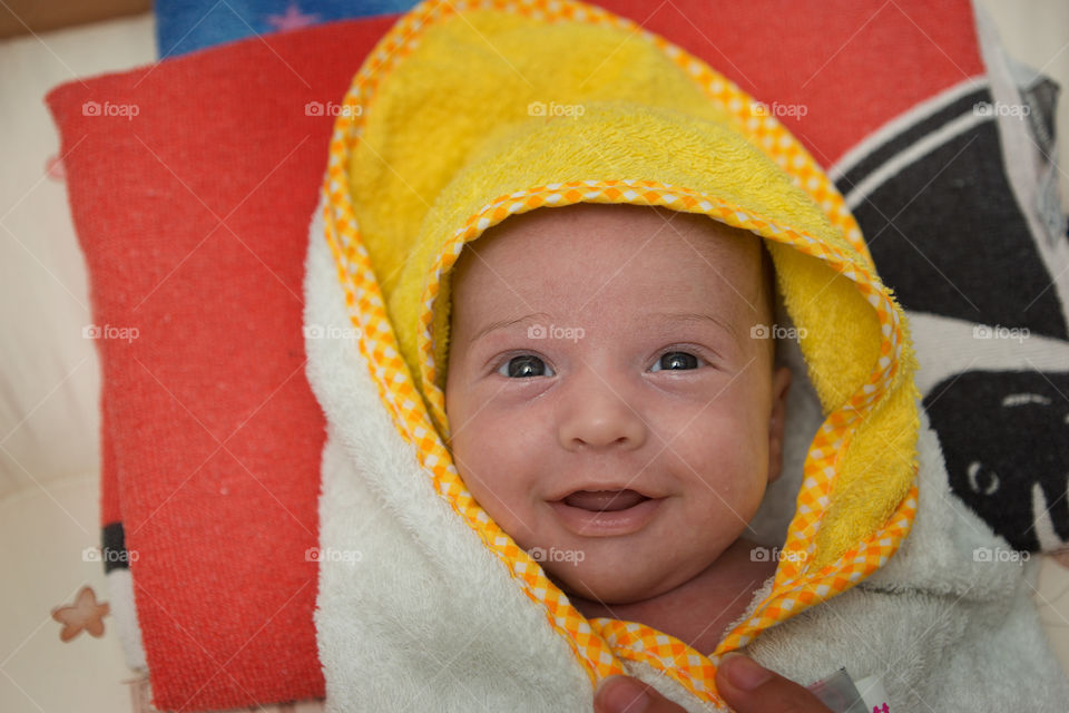 High angle view of smiling sweet baby