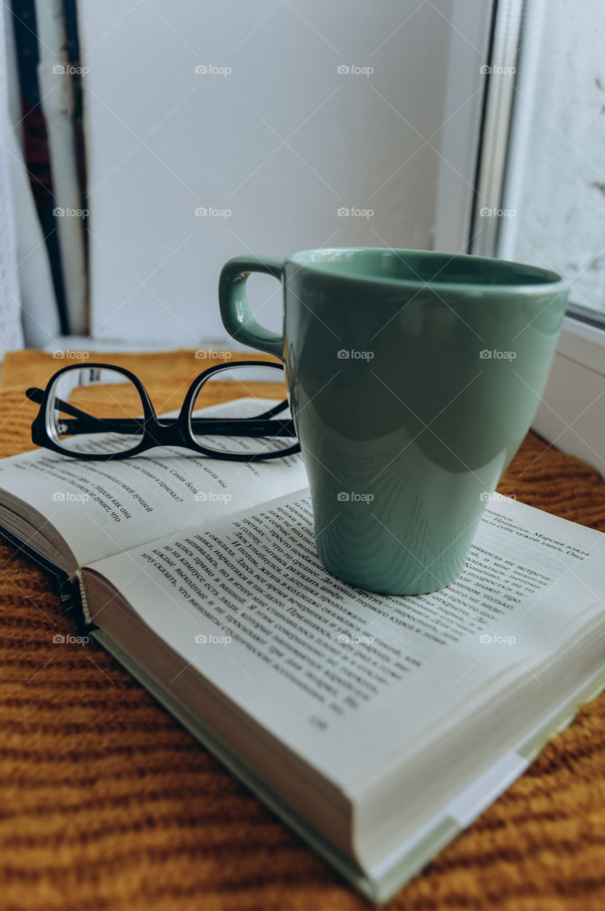 Books are, in fact, a text printed on paper, some information, several sheets that are fastened together.